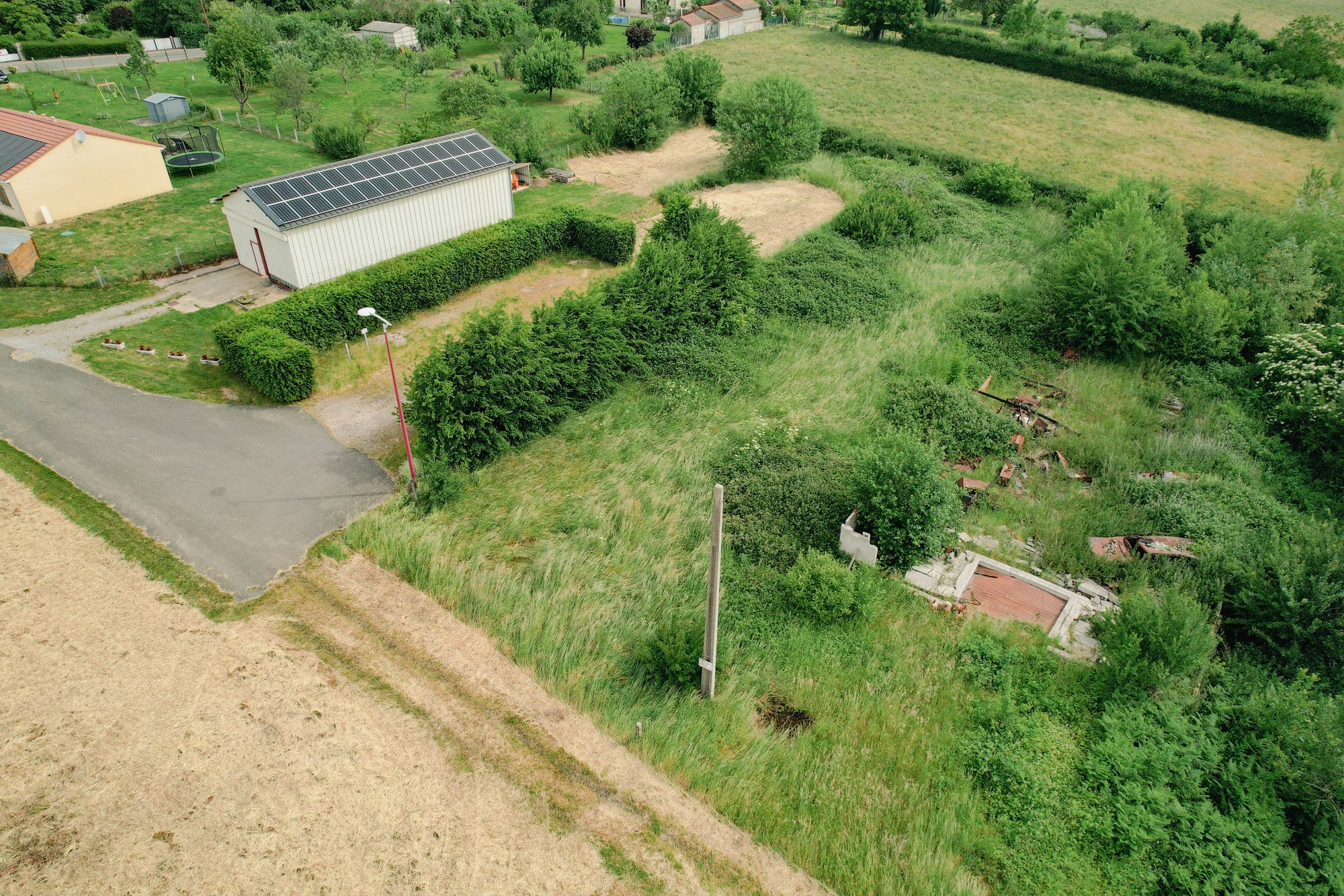 Vue aérienne du site - environnement boisé